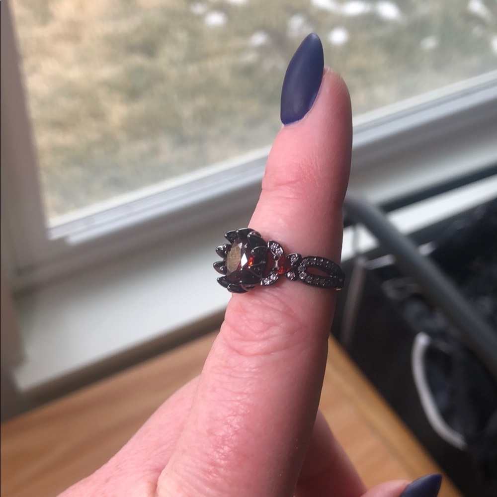 Elegant Black and Red Gemstone Ring